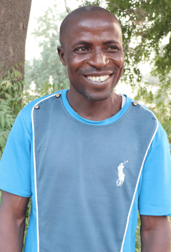 Man standing outside and smiling 